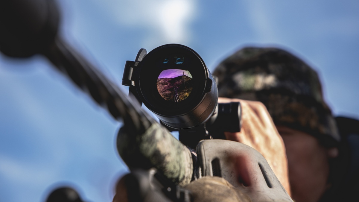 Point-of-view shot through a thermal scope showing target clarity and reticle detail for improved identification and shot placement.